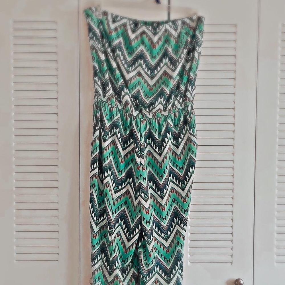 2B Bebe Beautiful and colorful strapless jumpsuit.